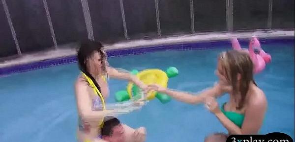  Bikini babes gives a blowjob and foursome by the pool